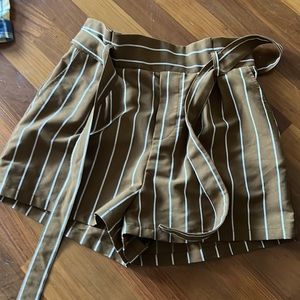 brown and white shorts